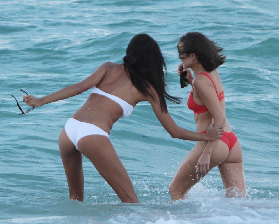  And appeared to be keen to get Olivia to dive right into the cool waves with her