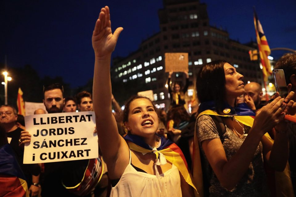  Dozens of people protested the Spanish government announcement