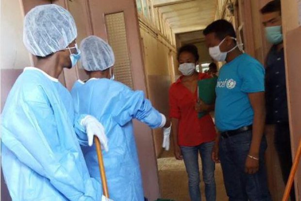 Staff at at Black Death treatment centre wear gloves and masks to protect themselves from catching the killer bug