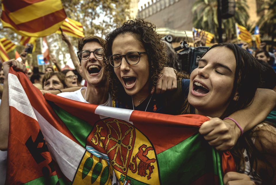  Young independence supporters appear to be overcome with emotion on the streets of Barcelona