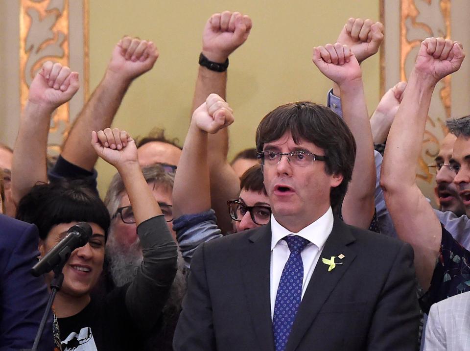 Puigdemont remained defiant, tweeting: 'Catalonia is and will be a land of freedom'