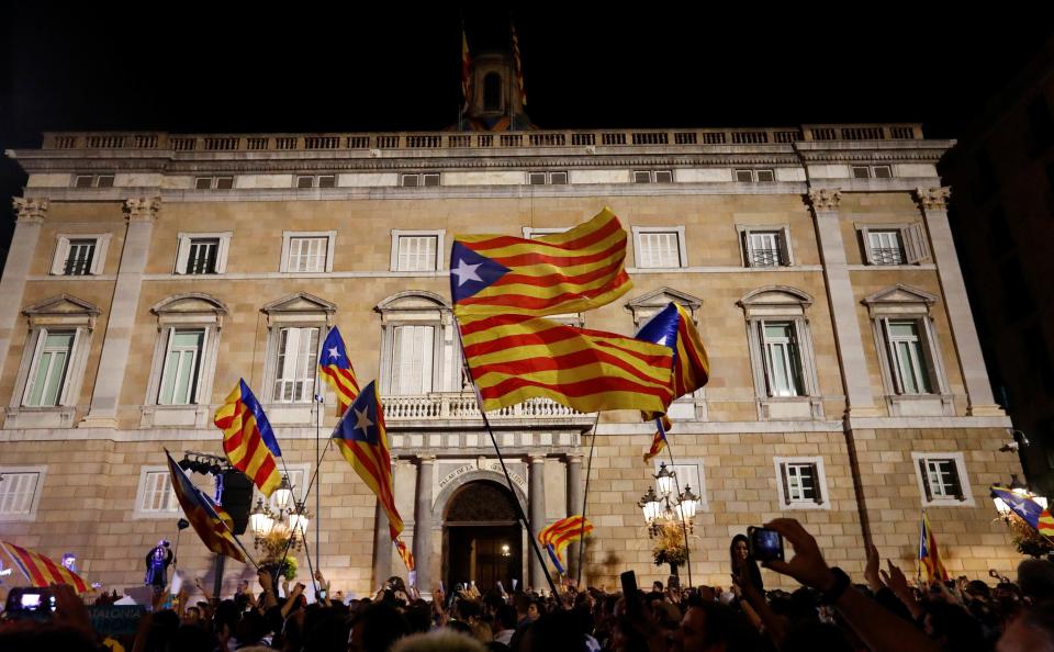  Proud Catalans wave flags and celebrate in Barcelona