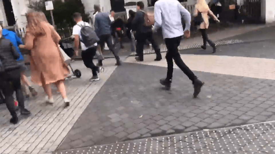  Dozens of pedestrians, some wheeling pushchairs, ran as panic spread following the crash