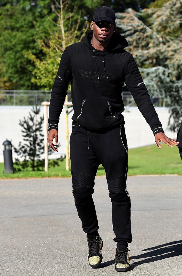  Pogba is regularly spotted wearing Balmain, like this biker tracksuit he wore when arriving at training