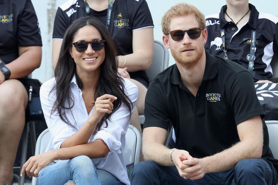 Smitten... Prince Harry and Meghan Markle attend a Wheelchair Tennis match during the Invictus Games 2017 at Nathan Philips Square 