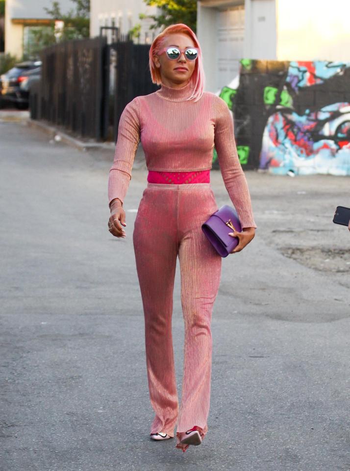  Dressed in pink the former X Factor judge looked like she means business