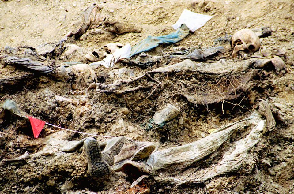 Bodies of Bosnian men and boys lie in a mass grave after the Srebrenica massacre 