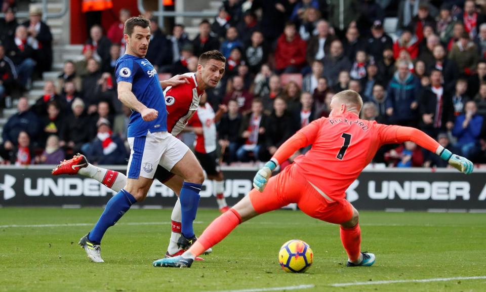 Dusan Tadic slips his shot through the legs of Jordan Pickford top open the scoring