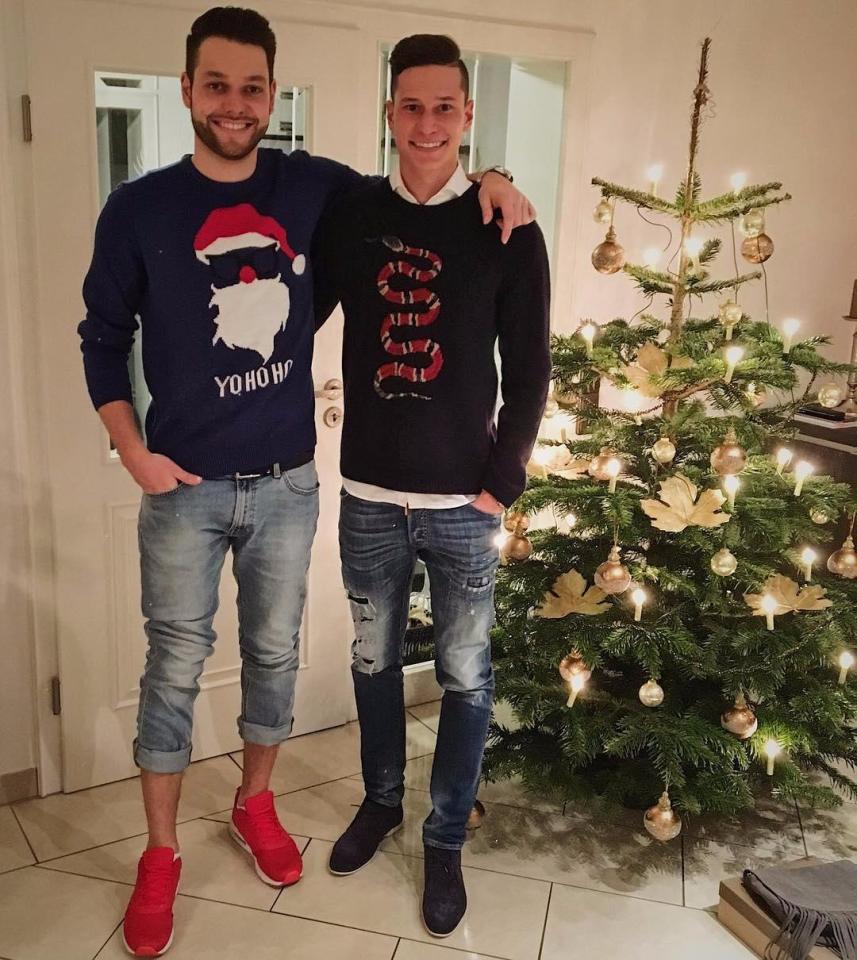  Julian Draxler is Team Gucci in a Blue Snake wool sweatshirt costing £735