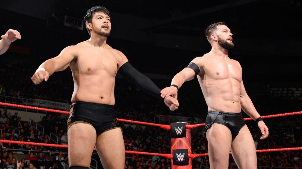  Japanese wrestling star Hideo Itami and Finn Balor stand victorious