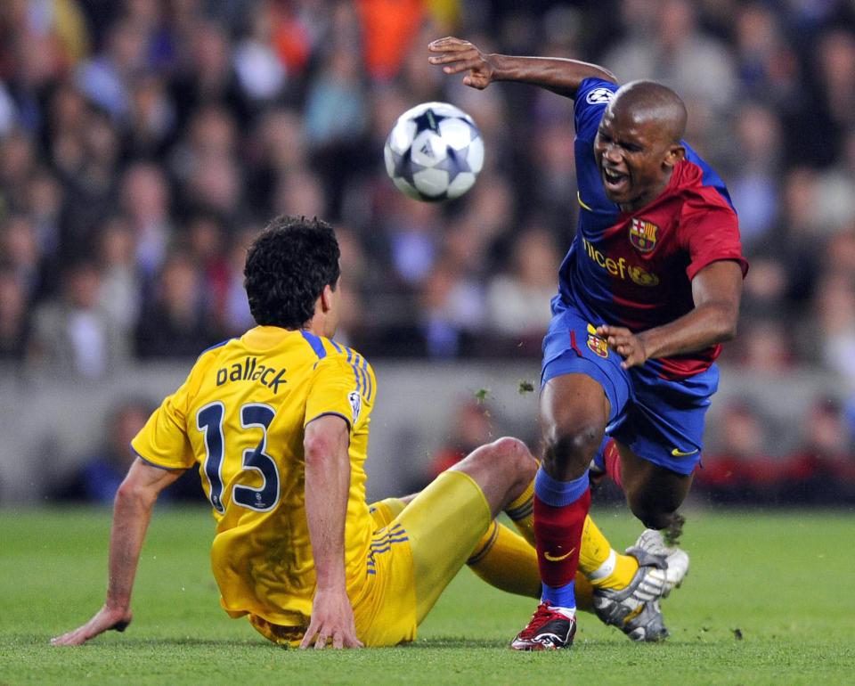  Michael Ballack takes down Samuel Eto'o
