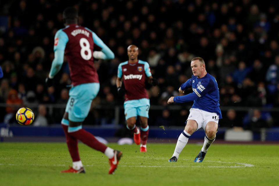 Rooney fires home a strike from inside his own half against West Ham