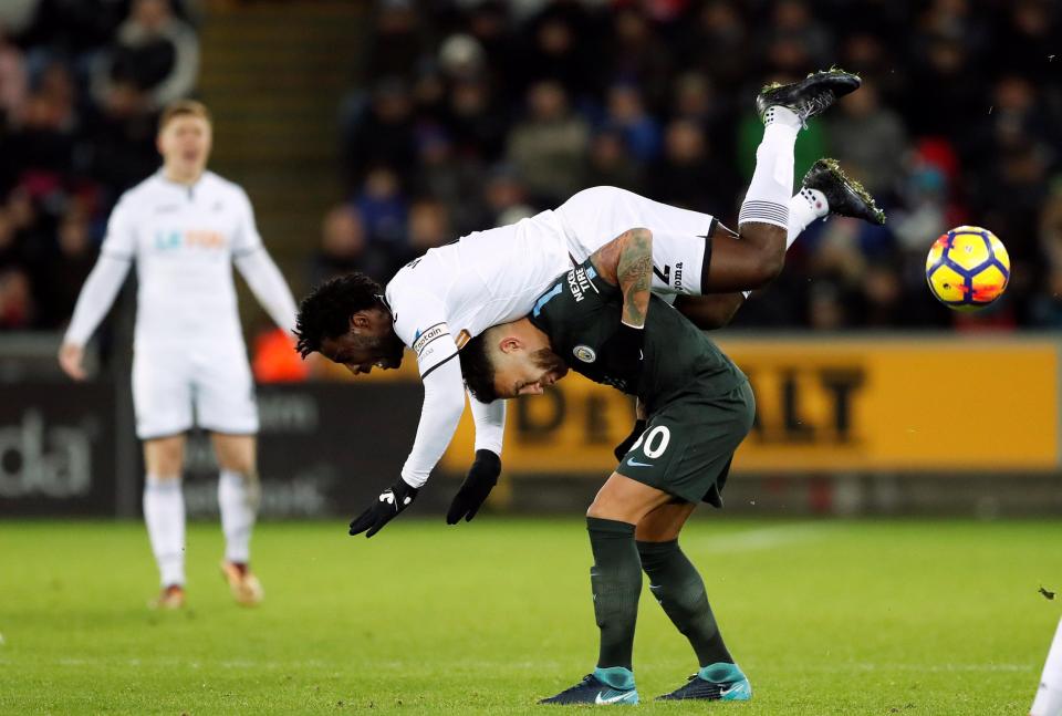  Wilfried Bony gets involved in a tussle