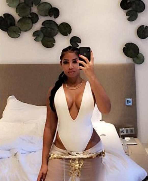  Then Kasi switched to an all-in-one white swimsuit