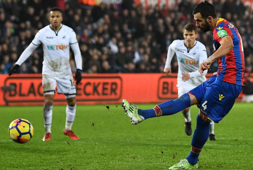  Luka Milivojevic put Palace ahead from the penalty spot at Swansea