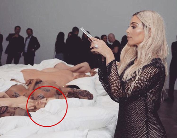  Kim Kardashian has been accused of re-starting her feud with Taylor Swift by posting this 'nude' snap of her online