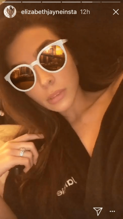  She also hinted she's back in their home in Essex after snapping a picture of herself in his dressing gown