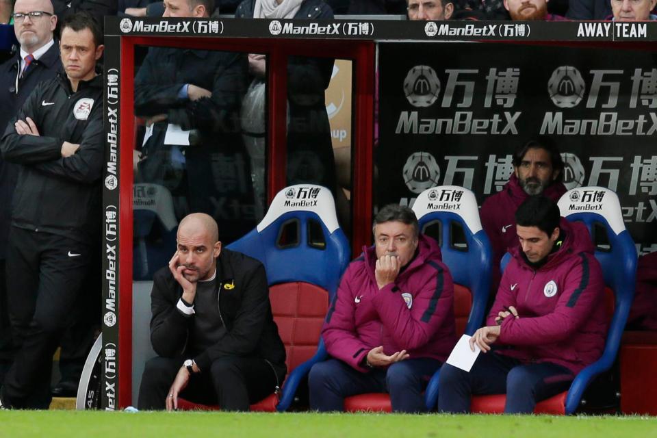  Pep Guardiola looks dejected during the clash against the Eagles