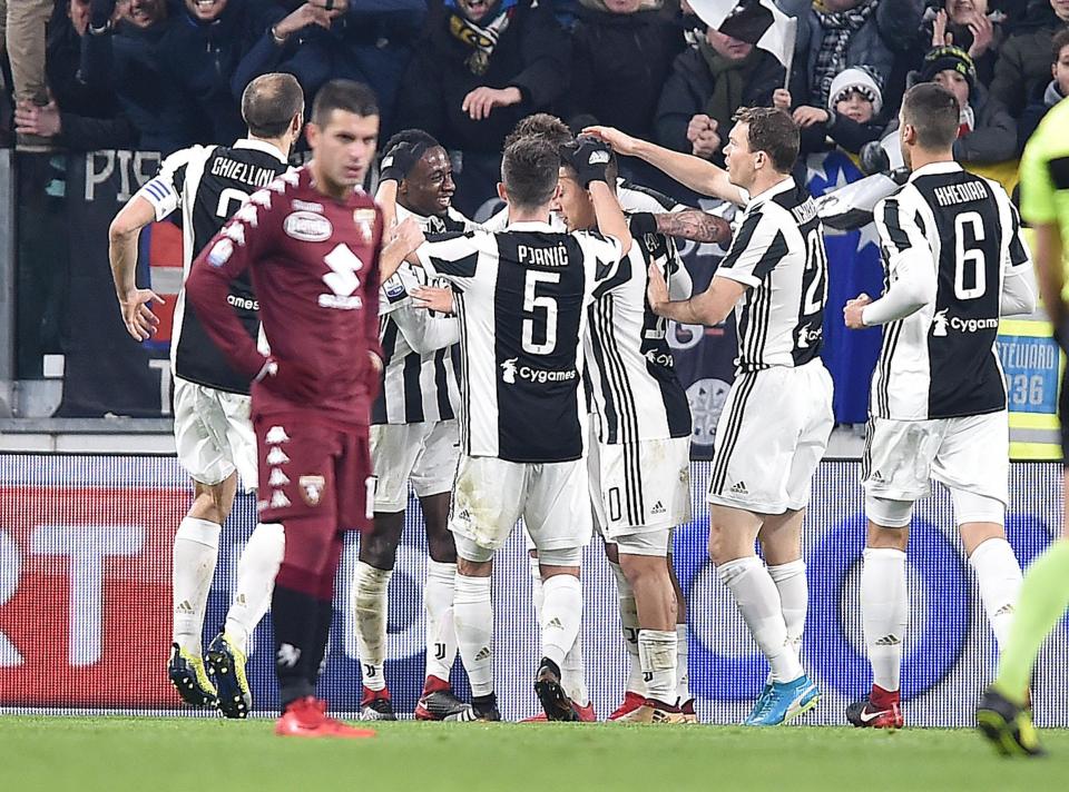 Juventus players celebrate as they beat Torino 2-0 in Coppa Italia quarter-final
