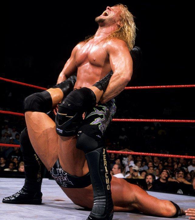  Putting rival Triple H in the Walls of Jericho in 2000