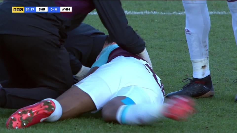  The West Ham star immediately fell to ground after getting a whack to the back of his head