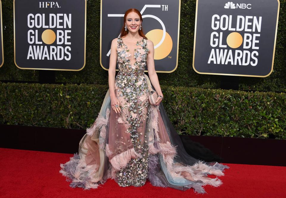 She appeared to be wearing several rugs at the glittering ceremony