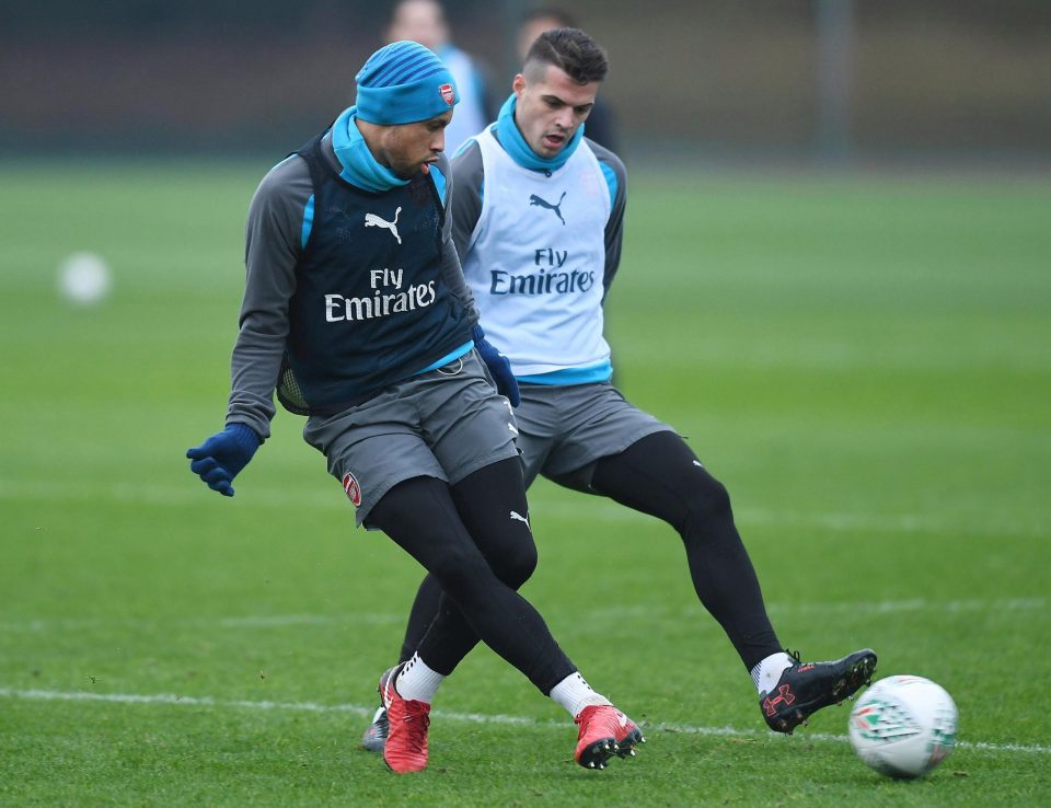  Coquelin with Granit Xhaka in his last Gunners training session on Tuesday