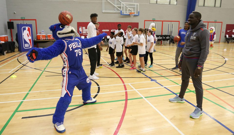  Sixers mascot Franklin the Dog balances a ball on his head