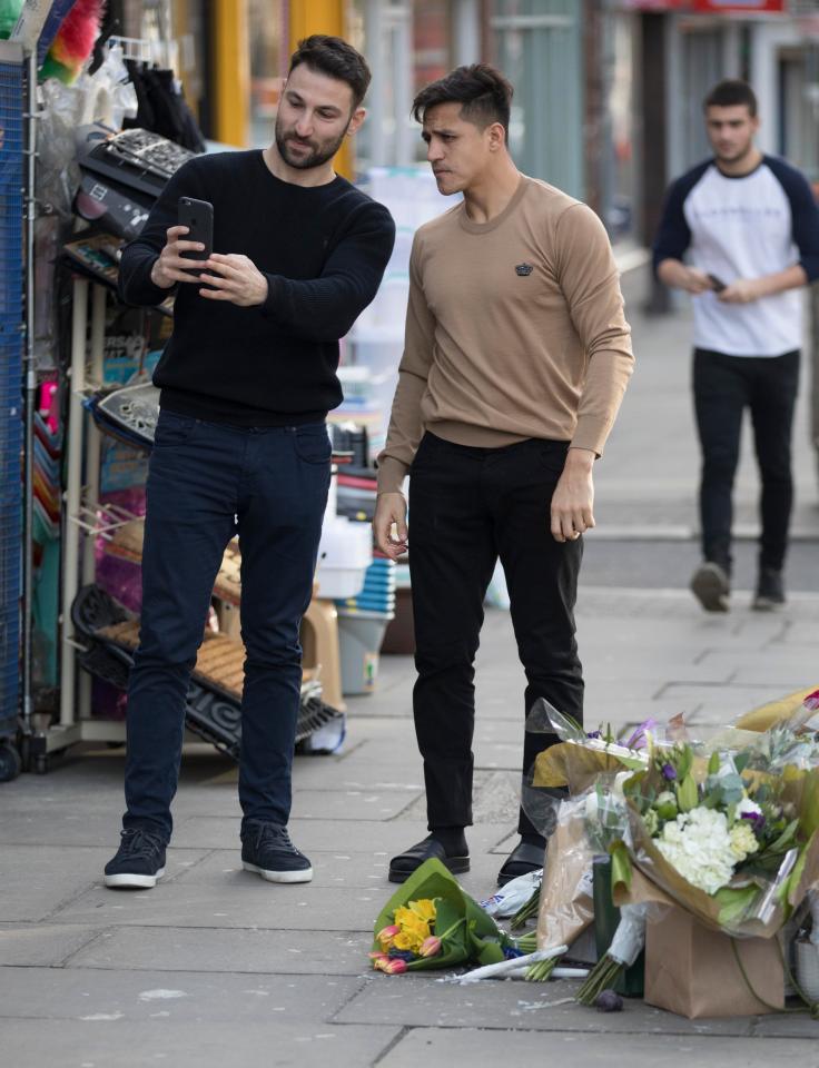 Manchester United target Alexis Sanchez looked disinterested as he engaged with fans in Mill Hill on Wednesday