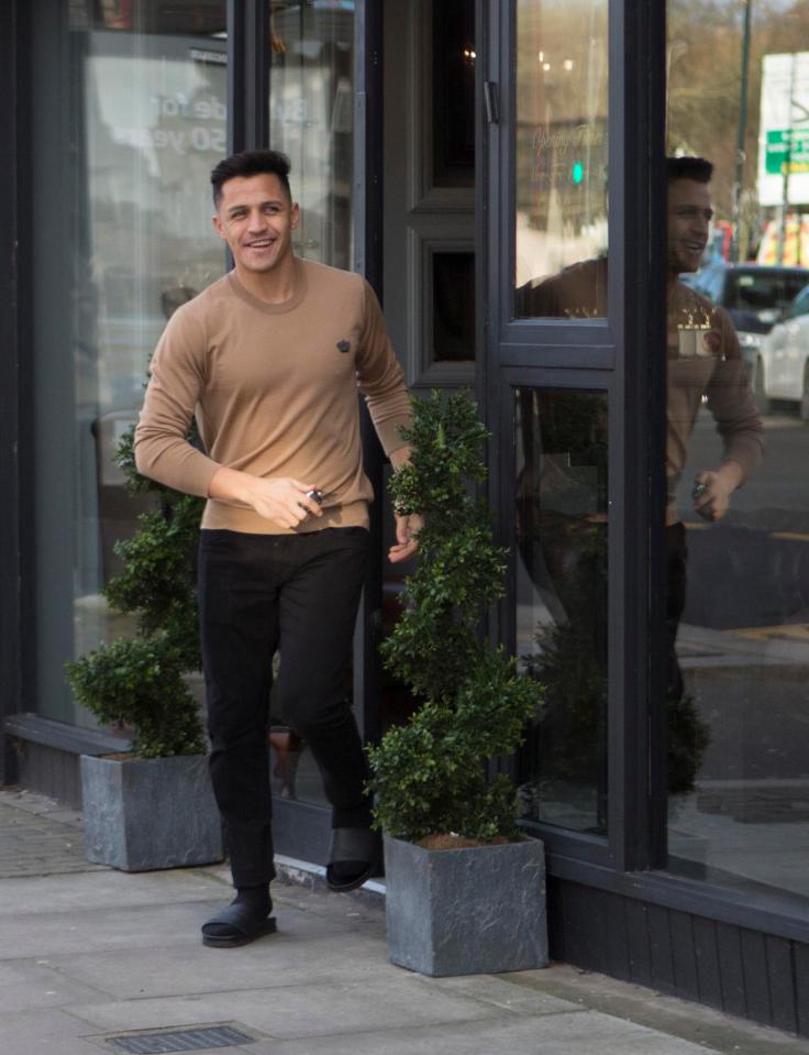 Alexis Sanchez looked sharp as he re-emerged from the barber's with a freshly trimmed head of hair
