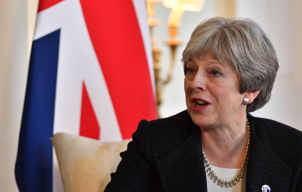  Theresa May has played down leaked Government Analysis which says the UK will be worse off post-Brexit