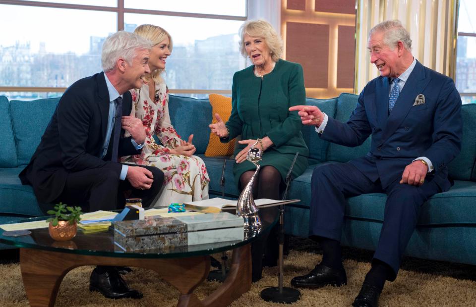  Presenters Holly Willoughby and Philip Schofield enjoy a joke with His Royal Highness and the Duchess of Cornwall on This Morning's 30th anniversary show