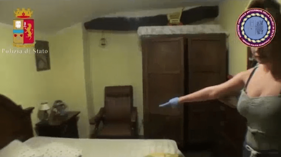  She is seen pointing out to cops where she shared a bed with her alleged kidnapper