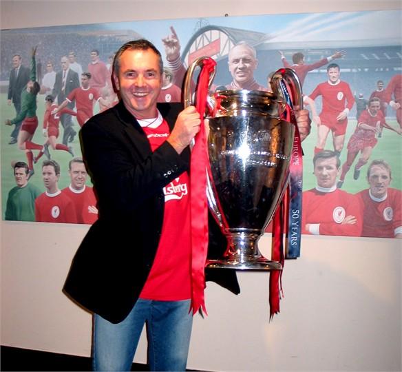 Liverpool: Alan is an avid Liverpool fan