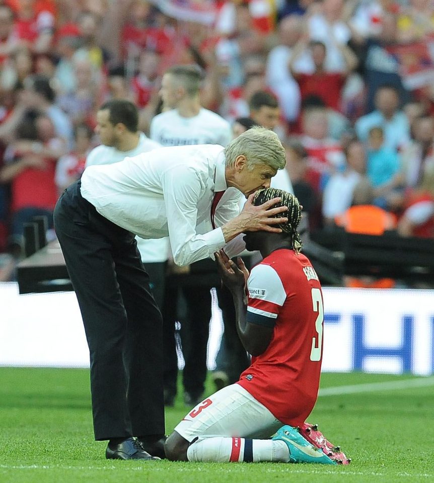  Arsene Wenger and Bacary Sagna celebrate winning FA Cup with Arsenal in 2014.