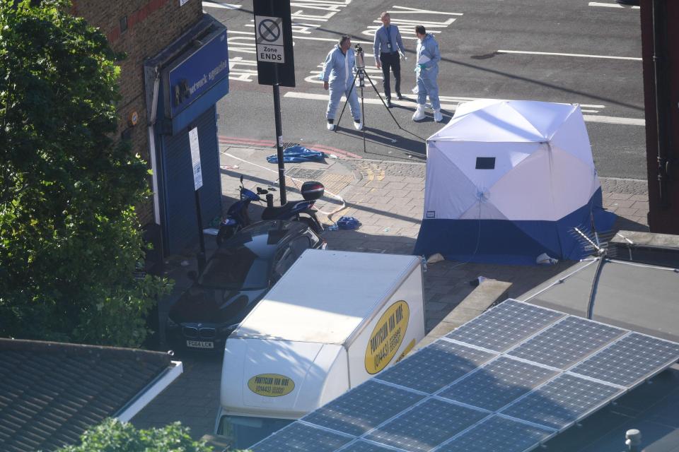 The horrific aftermath of the attack, with forensic tents set up at the scene