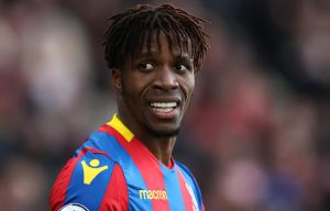 Palace blow as Wilfried Zaha ruled out of relegation run-in with knee injury