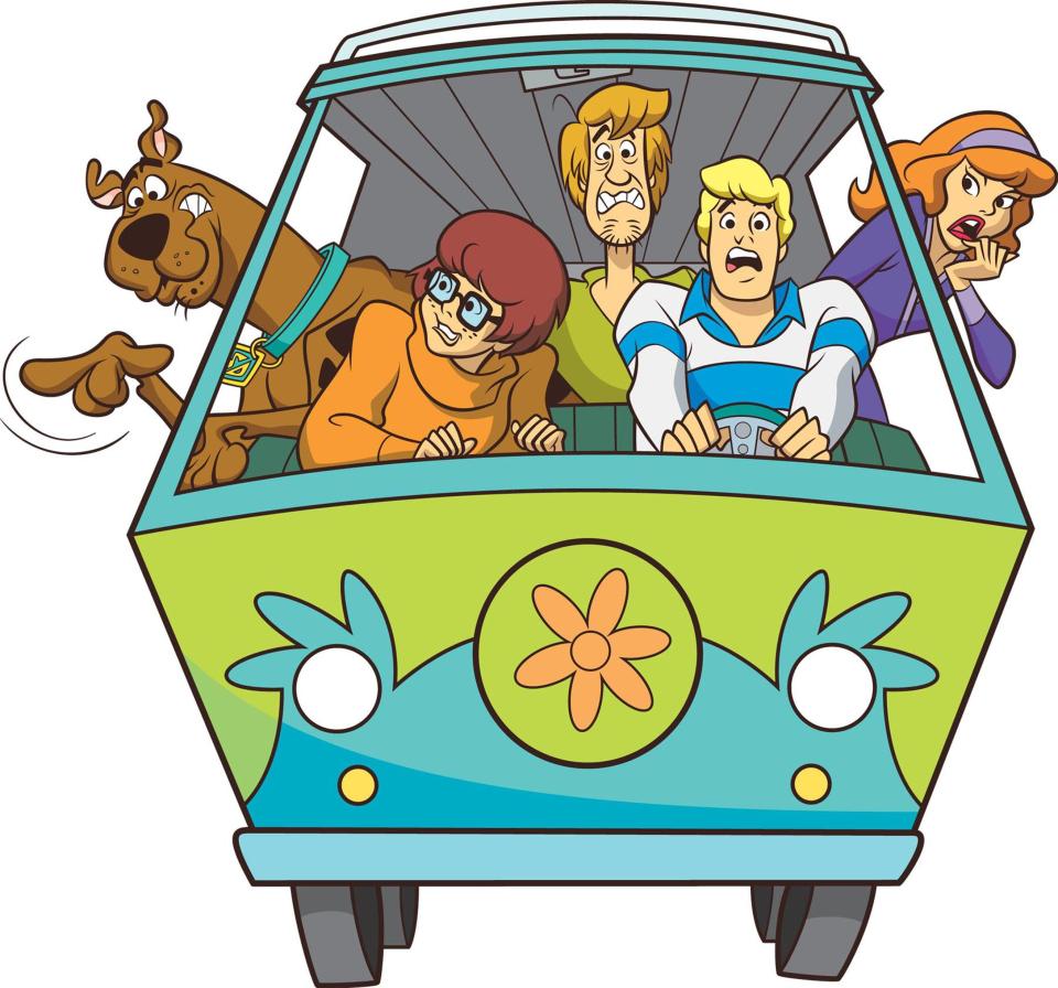 The backpacker's van is painted to resemble the famous Mystery Machine from Scooby Doo