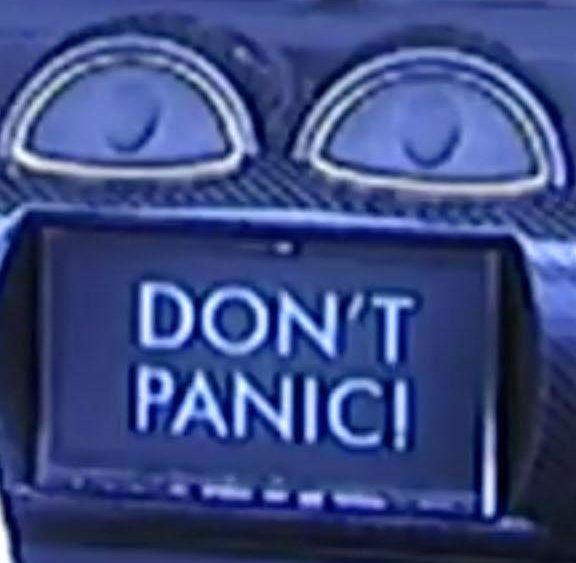  The 'Don't Panic' sign on the space cars dashboard will hopefully put the dummy's mind at ease