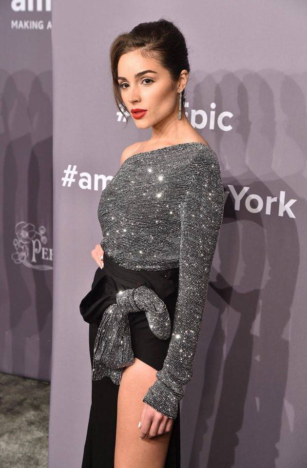  Olivia sparkled in her gown, which also featured a thigh high split