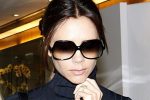 Victoria Beckham wears a polo neck as she opens a new shop in Hong Kong