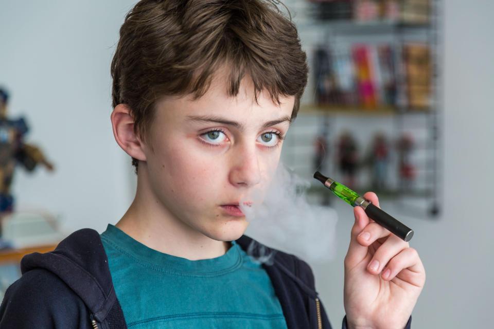 E-cigarettes could increase a person's cancer risk even if there's NO nicotine, experts have warned
