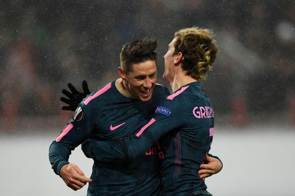 Fernando Torres scored twice as Atletico thumped Lokomotiv Moscow