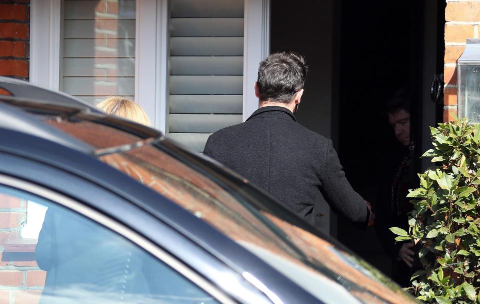  The TV presenter was later seen arriving back at home after his brief trip to the police station