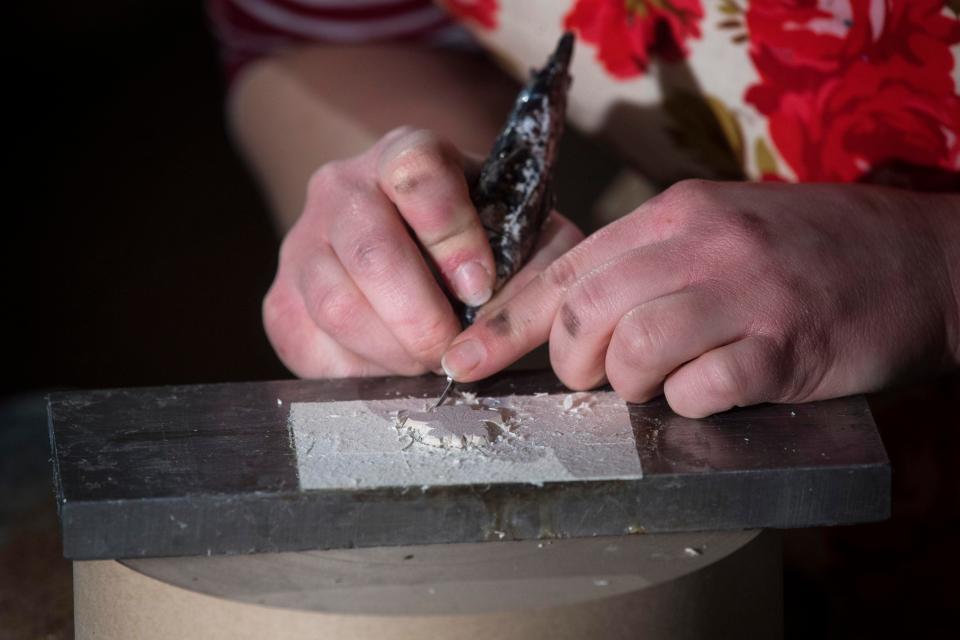  The crests are hand-cut by Lottie in the Barnard & Westwood workshop in London
