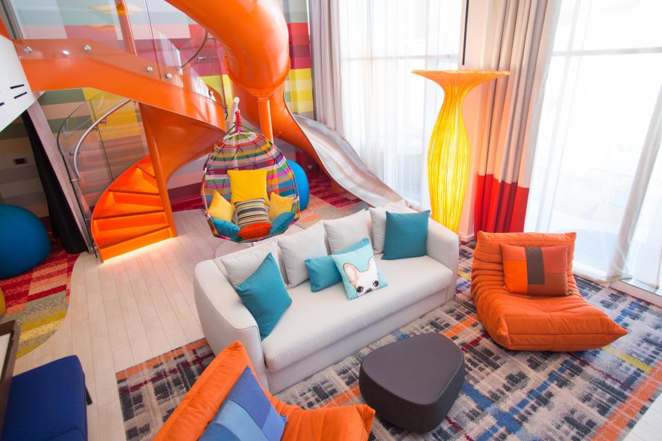 There’s lots in the suite to keep everyone entertained - a floor-to-ceiling Lego wall, a dining table that converts into an air-hockey pitch and a slide between the floors 