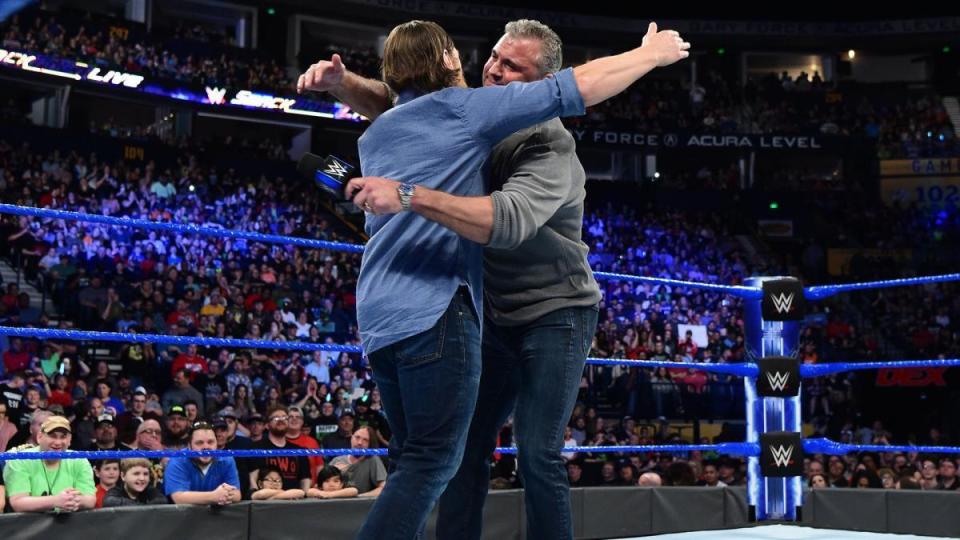  Daniel Bryan and Shane McMahon hug it out before WrestleMania
