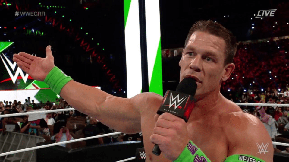  John Cena thanks the fans after beating Triple H
