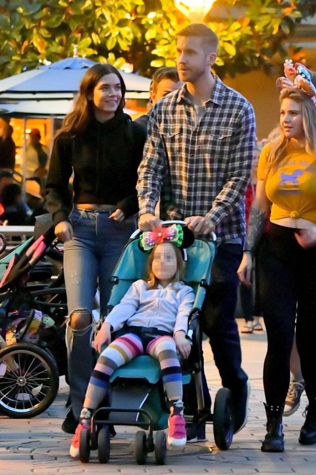  Aarika looked lovingly at the DJ during their trip to Disneyland