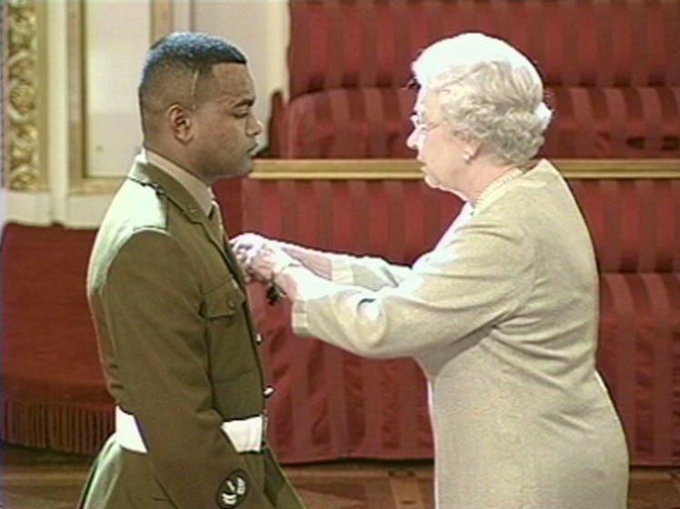 Johnson receiving his VC from the Queen in 2005